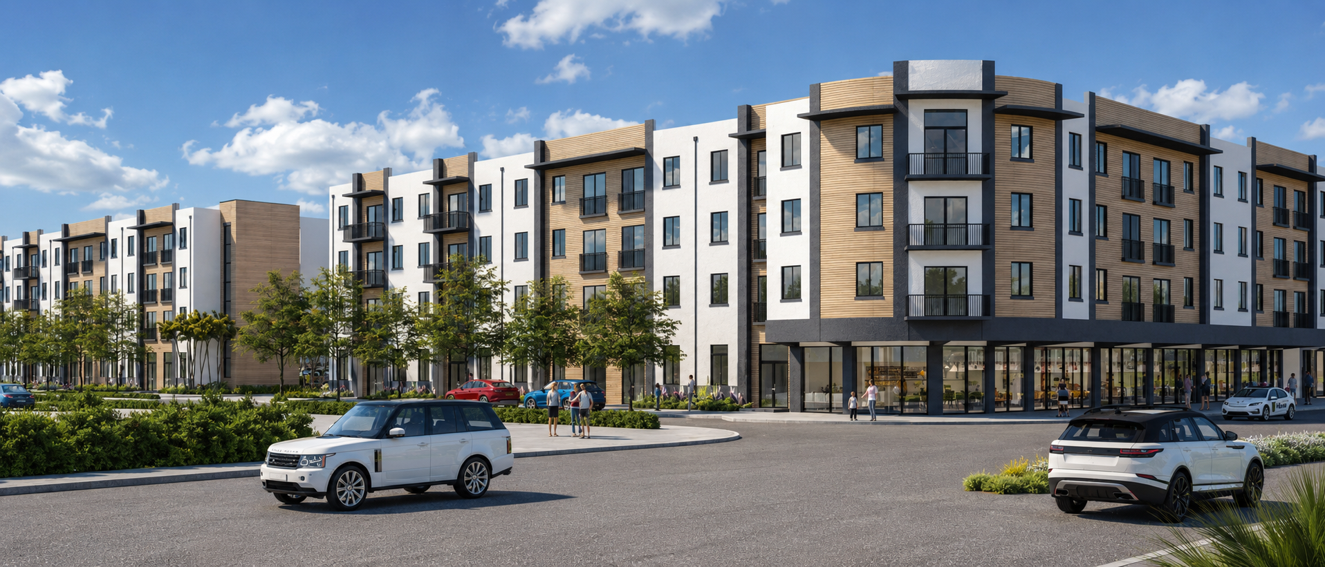 A modern apartment complex with balconies and a pedestrian walkway.